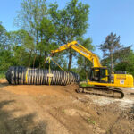 Komatsu PC210 Bagger von HKL Baumaschinen für Neubau des Freibads Mählersbeck