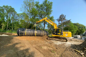 Komatsu PC210 Bagger von HKL Baumaschinen für Neubau des Freibads Mählersbeck