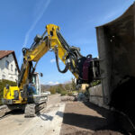 Ein Praxisbericht zeigt, wie der Drehantrieb Holp RotoTop am Wacker Neuson ET90 Arbeitsabläufe beschleunigt