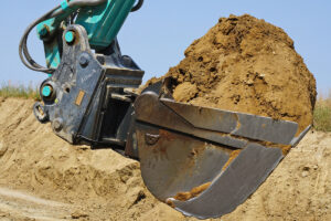 Kobelco SK520LC-11E im Kieswerk Oberwangen